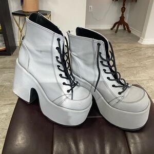 Demonia platform boots reflective gray.